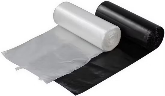 Rolls of black and white can liner bags for restaurant waste management